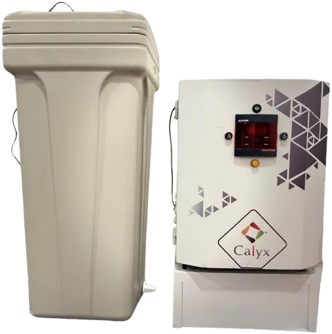 A CalyxSoft softener tank beside a compact Calyx cabinet.